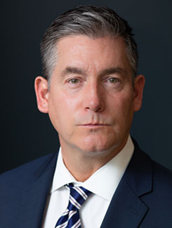 Headshot of attorney John Vaughn